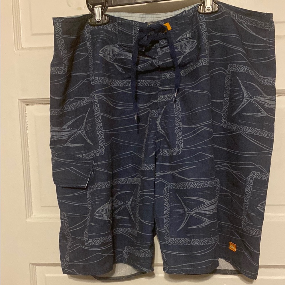 Quiksilver Blue and White Board Shorts with Abstract Wave and Fish Pattern